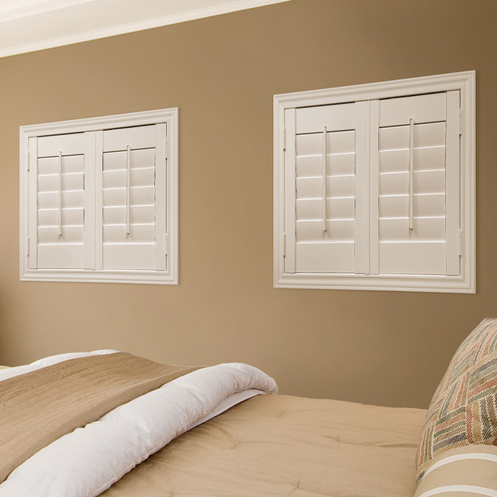 White shutters in a kitchen entrance.