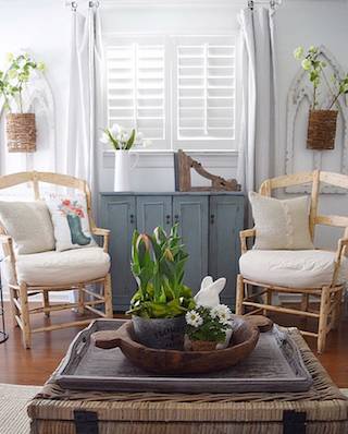 Interior shutters in breezy sunroom.