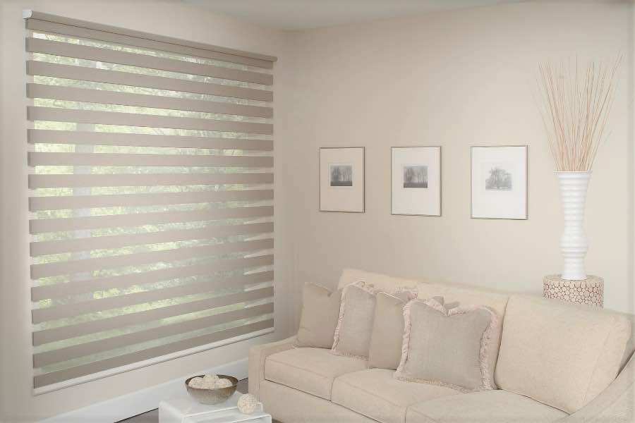 Zebra shades give you a unique combination of light control and style that benefits your Miami home. Zebra shade allows filtered light into a living room