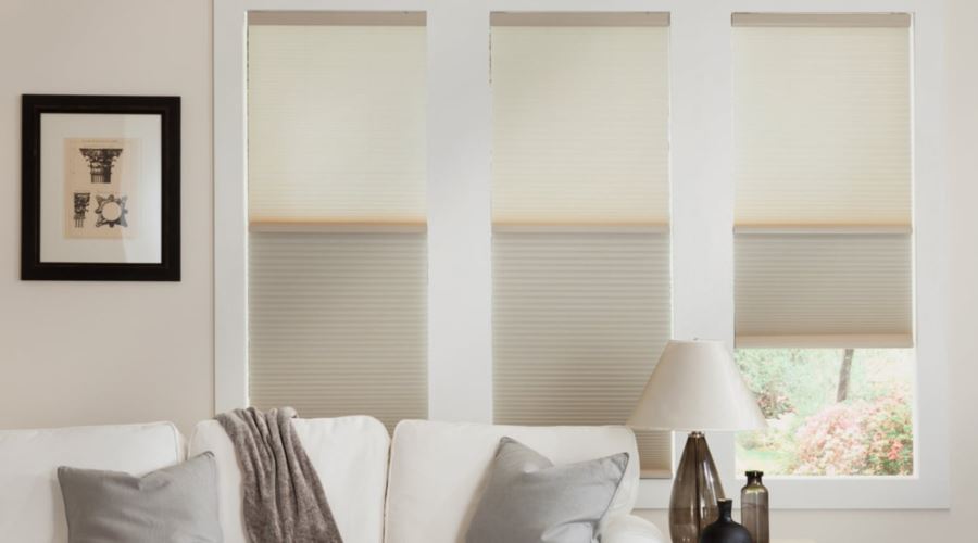 Cellular shades are energy efficient and stop air from entering through your window. Cellular shades in a Miami living room