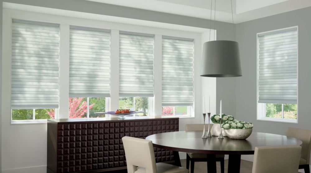Cordless motorized shades in a Miami dining room