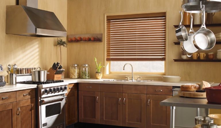 Faux wood blinds look stunning in Miami kitchens. Miami kitchen faux wood blinds.