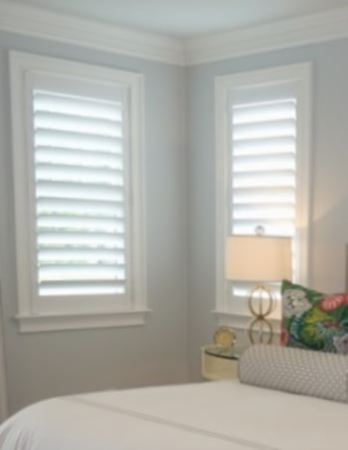 Hidden tilt rod shutters open. Polywood shutters with hidden tilt rods in Miami