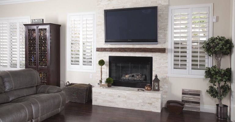 Shutters go with modern spaces incredibly well. white shutters in Miami family room