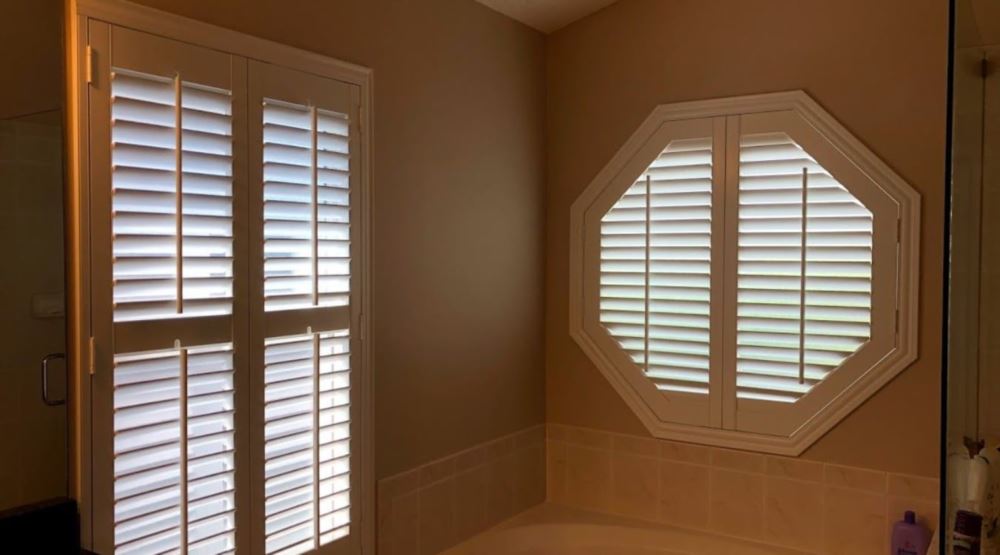 Octagon window treatments Octagon window in a Miami bathroom