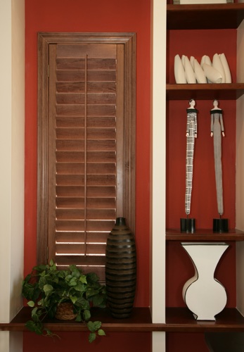 You can even coordinate your wood shutters with shelving. Miami wood shutter shelving