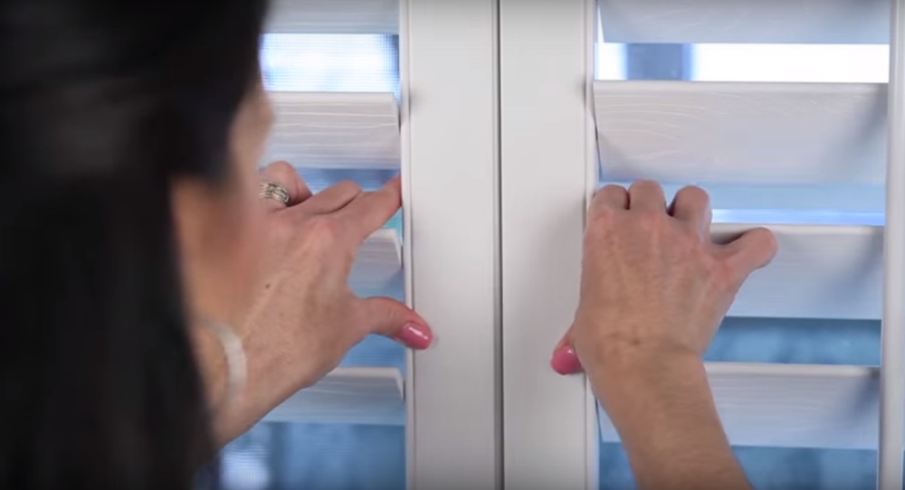 Closing The Panels Of Your Energy Efficient Shutters In Miami, FL Shutting plantation shutters
