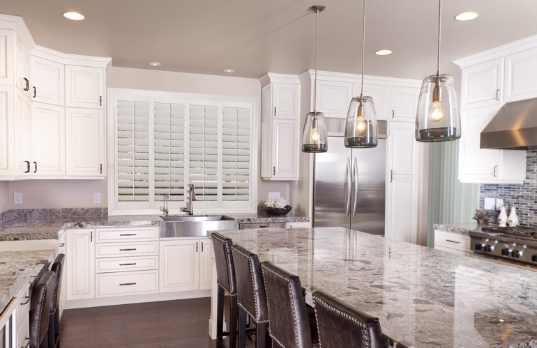 Kitchen Shutters In Miami, FL A kitchen window with plantation shutters